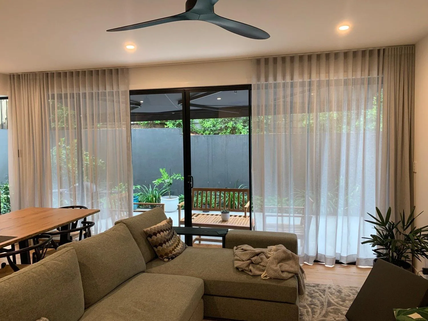 Outdoor awnings fitted along a covered area of a Brisbane home