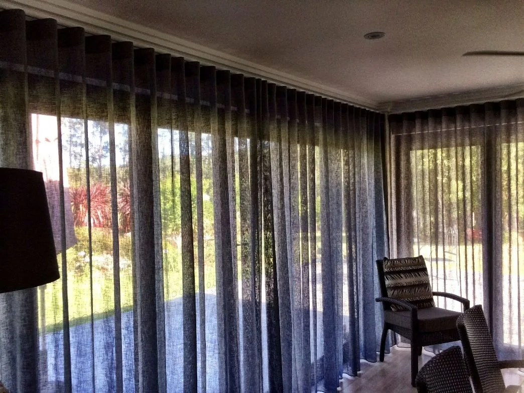 S-fold curtain waves seen close against a bright window